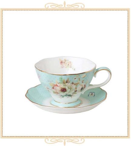 White Floral Blue Bone China Teacup and Saucer