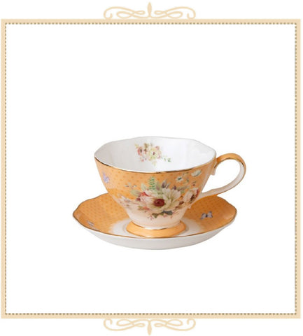 White Floral Yellow Bone China Teacup and Saucer