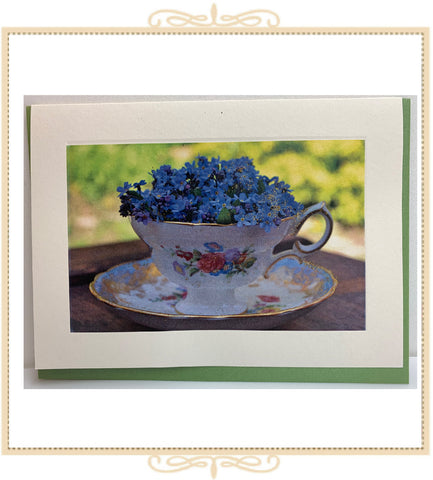 Teacup Full of Blue Flowers Greeting Card (QM21)